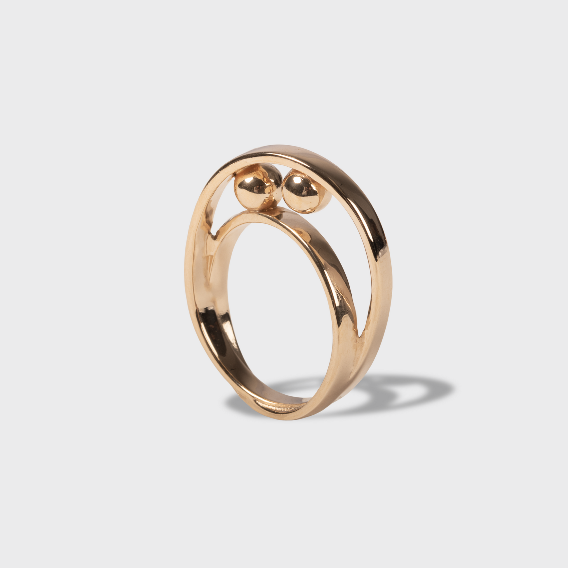 Bague en plaqué or avec deux boules 