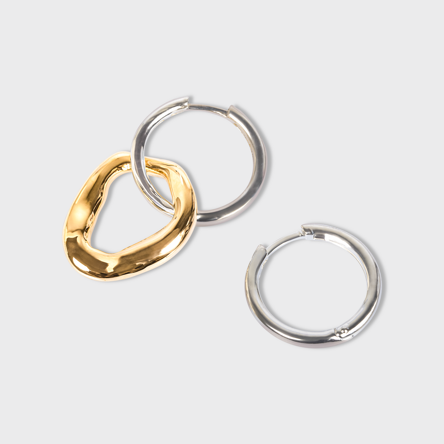 Boucles d'oreilles avec anneaux en bicolor