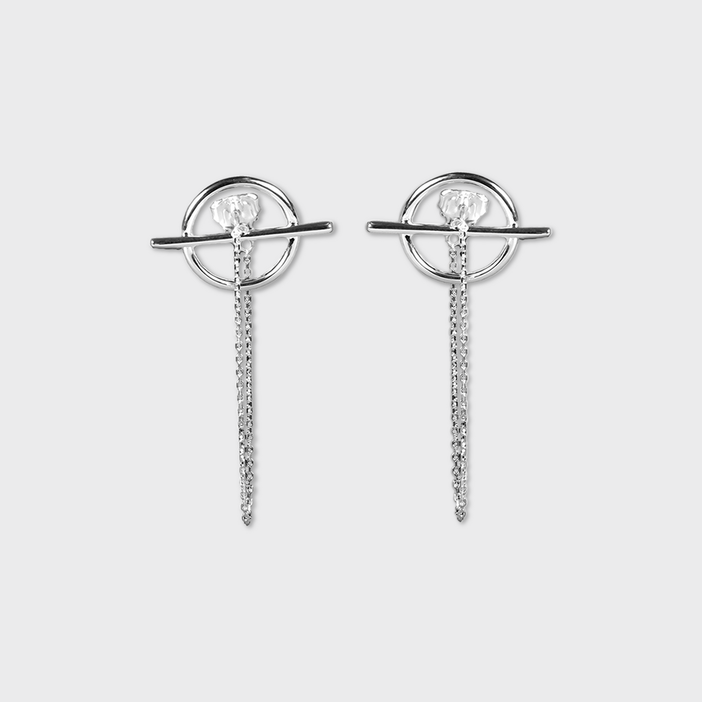 Boucles d'oreilles en forme de planète avec une chaine pendante 