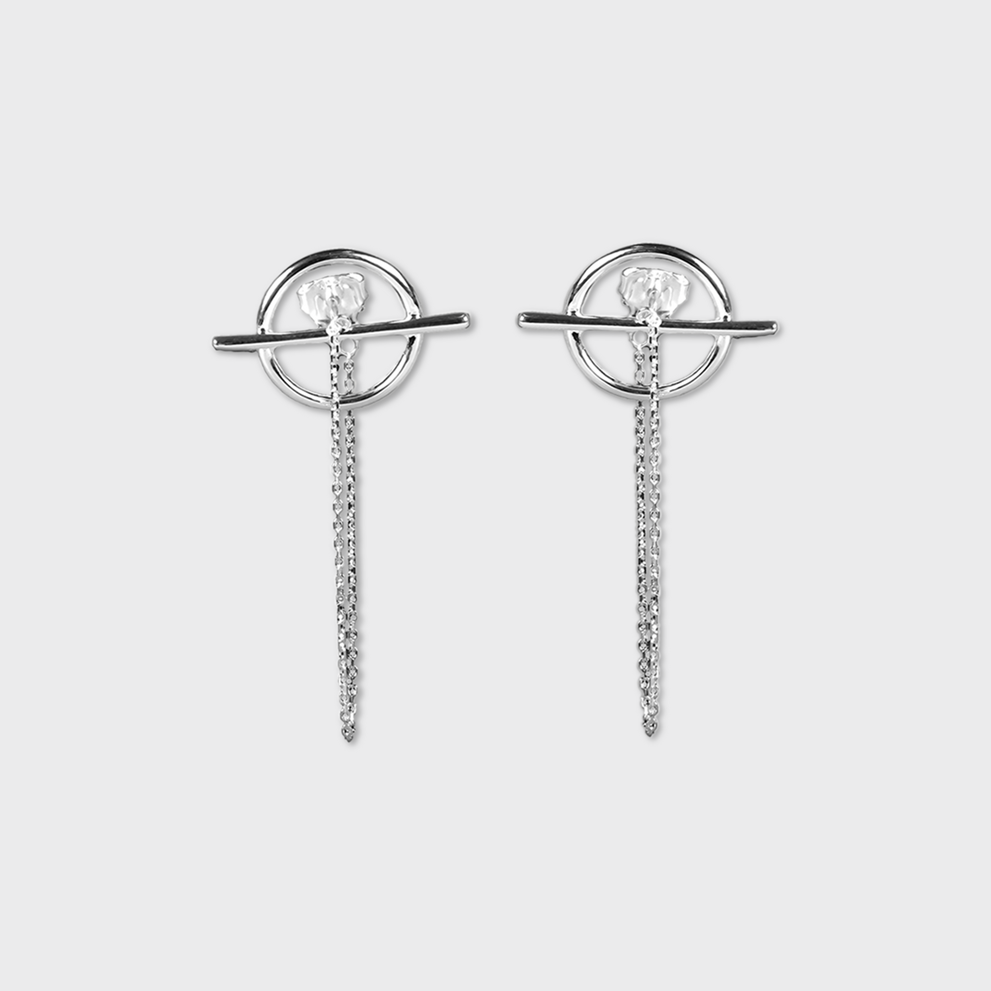 Boucles d'oreilles en forme de planète avec une chaine pendante 